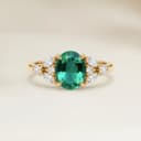 Floraler Ring mit ovalem Smaragd aus Sambia 1,05 ct