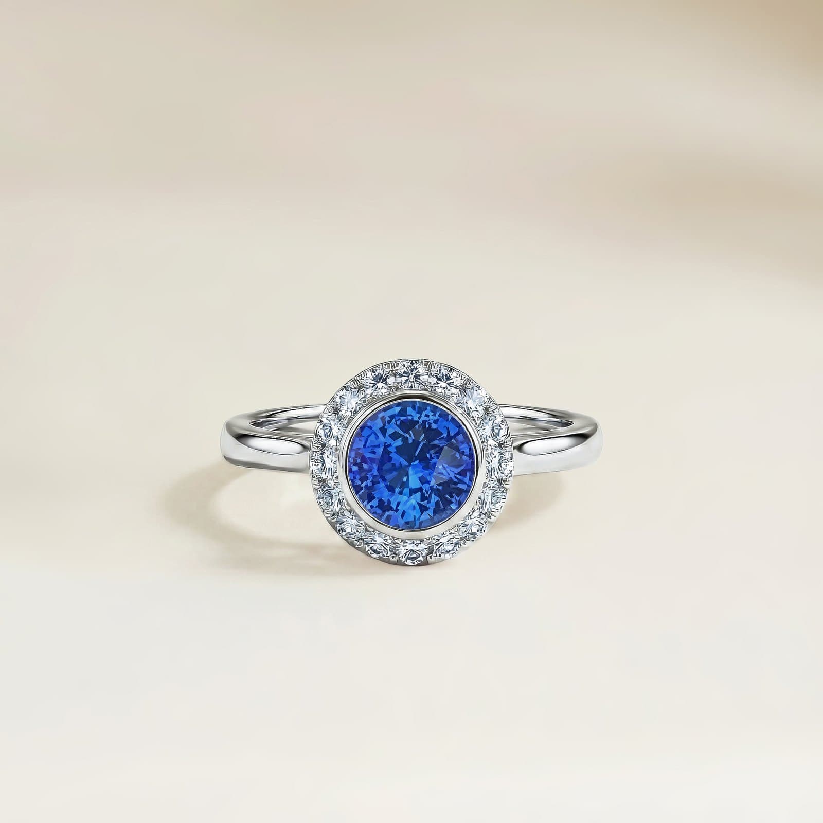 réalisation — solitaire bleu serti clos