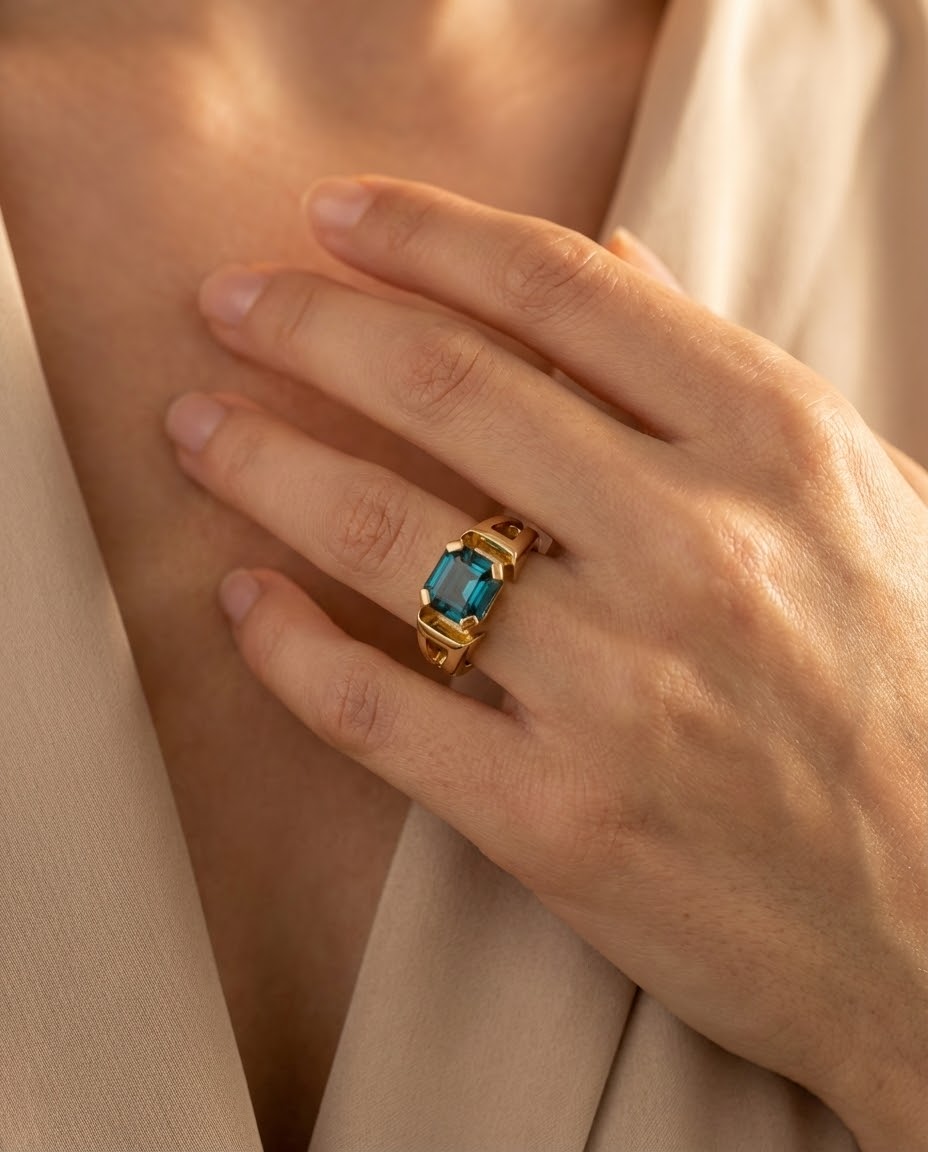 Birthstone ring with teal sapphire