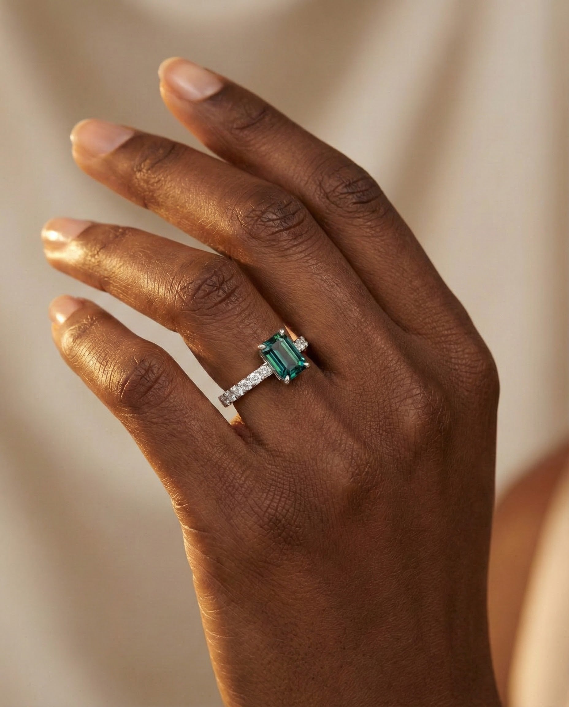 Engagement ring with teal sapphire