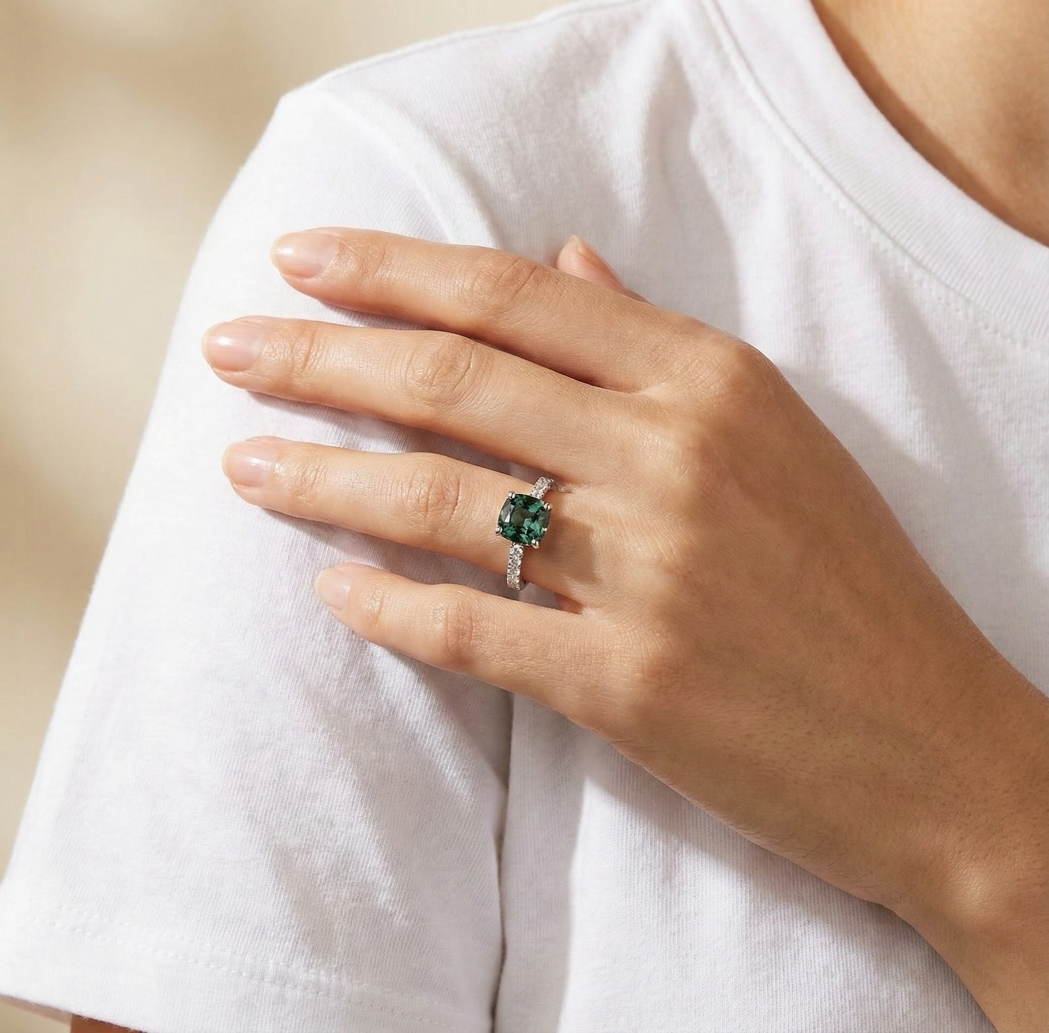 Engagement ring with teal sapphire