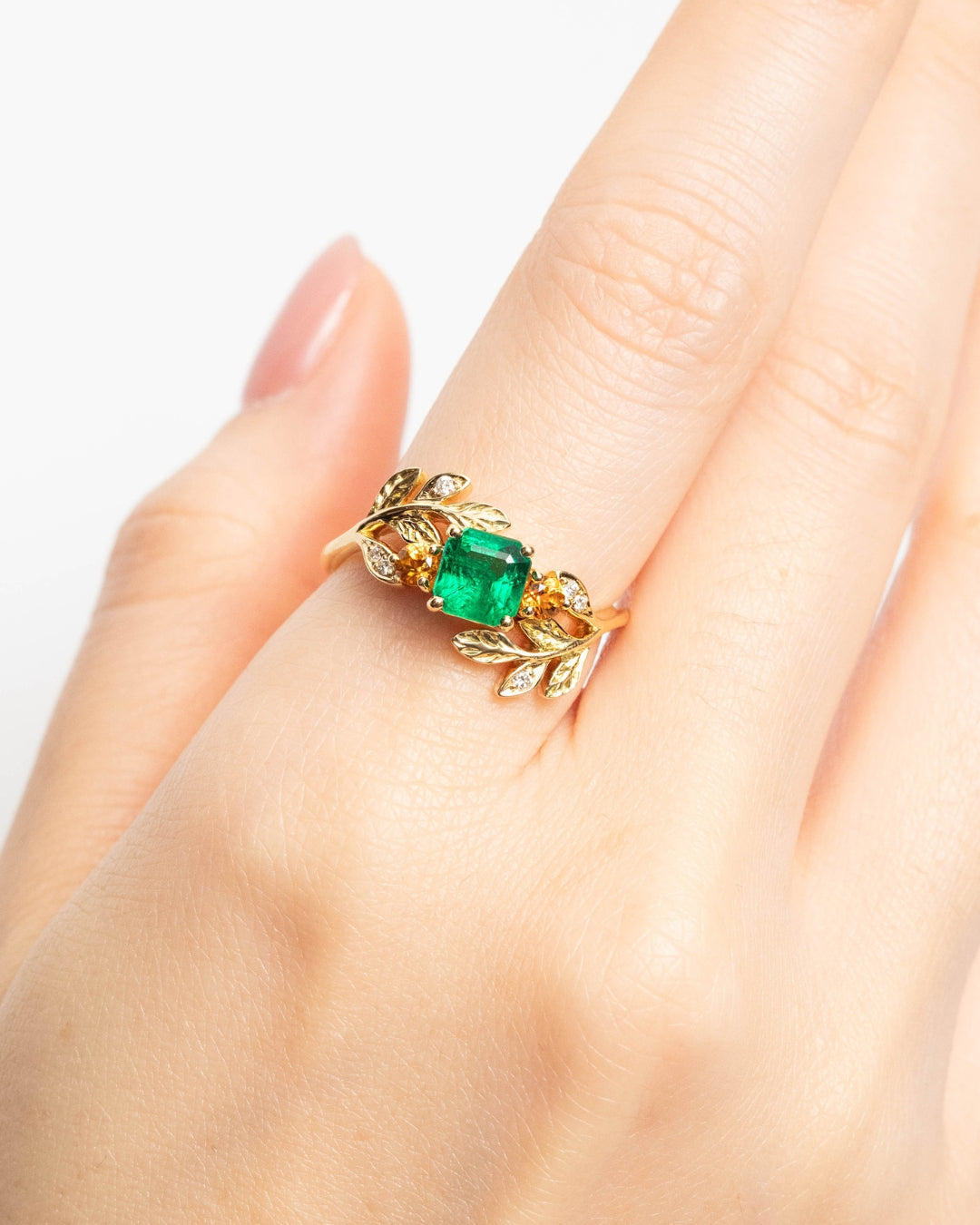 Engagement ring with Emerald and Citrines