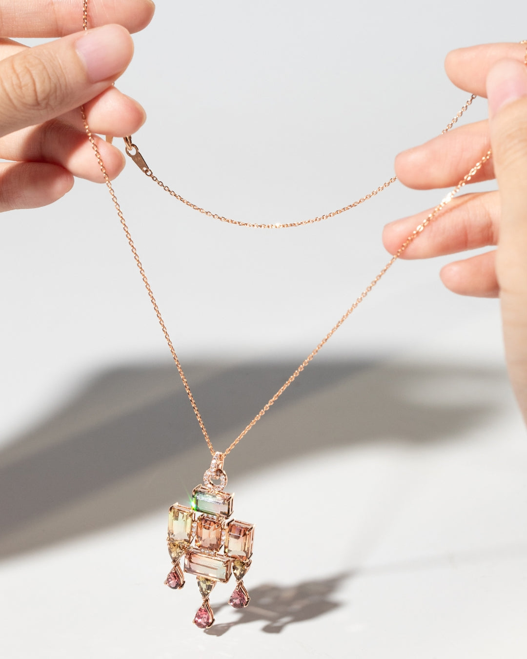 Rose gold pendant with two-tone Tourmalines