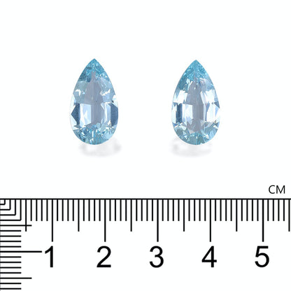 Deux pierres précieuses Aigue-Marine en forme de poire · 7,58 ct de Bonnot Paris sont placées côte à côte sur un fond blanc avec une règle en dessous indiquant l'échelle en centimètres de 1 à 5.