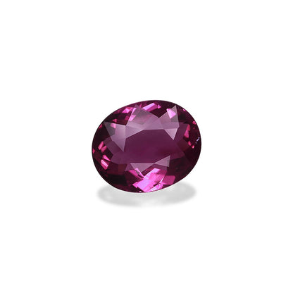 La Tourmaline Cuprifère · 2,31 ct de Bonnot Paris est une pierre précieuse de taille ovale d'un violet profond avec des surfaces facettées reflétant la lumière, sertie sur un fond blanc uni projetant une ombre subtile.