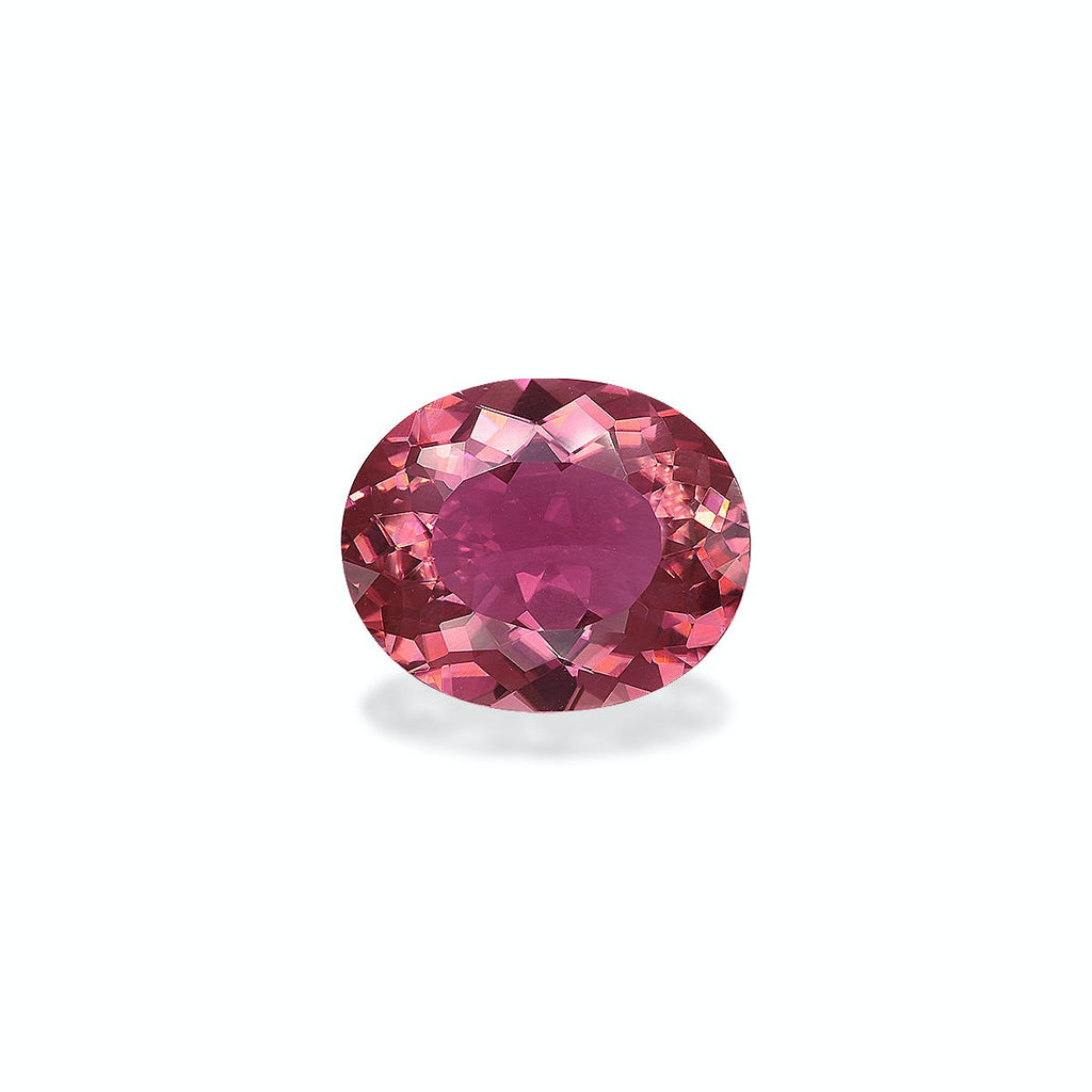 La Tourmaline Rose · 4,88 ct de Bonnot Paris présente une pierre précieuse rose rougeâtre à facettes, de taille ovale, présentée sur un fond blanc uni, mettant en valeur ses facettes complexes et sa couleur vibrante.