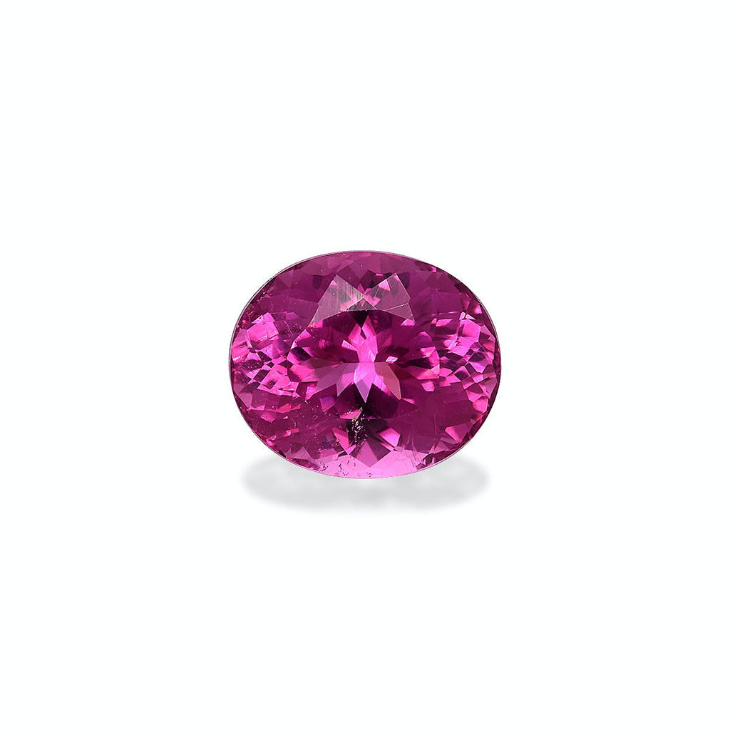 La Tourmaline Rubellite taille ovale de 4,35 ct de Bonnot Paris scintille tandis que ses facettes roses vibrantes reflètent la lumière sur un fond blanc uni.