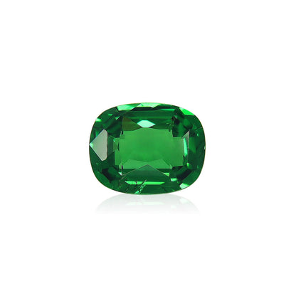 Bonnot Paris présente le Grenat Tsavorite, une pierre précieuse verte profonde polie de 1,7 carat avec une taille coussin, présentée sur un fond blanc.