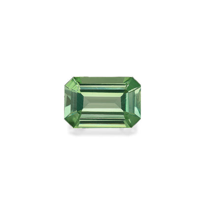 Bonnot Paris présente la Tourmaline Verte, une pierre précieuse verte taille émeraude de 4,82 carats sertie sur un fond blanc, mettant en valeur sa forme rectangulaire et ses facettes réfléchissantes.