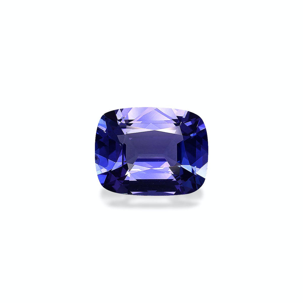 Une pierre précieuse Tanzanite taille coussin de 6,66 ct de Bonnot Paris présente une riche teinte bleu-violet, reflétant la lumière sur un fond uni.