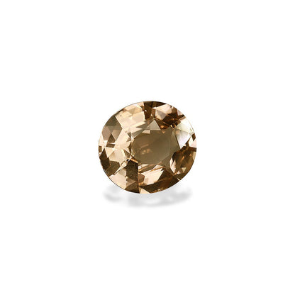 La Tourmaline Jaune de Bonnot Paris est une pierre précieuse ronde facettée brune de 5,98 carats avec une surface brillante et différentes nuances de brun, projetant une ombre subtile sur un fond blanc.