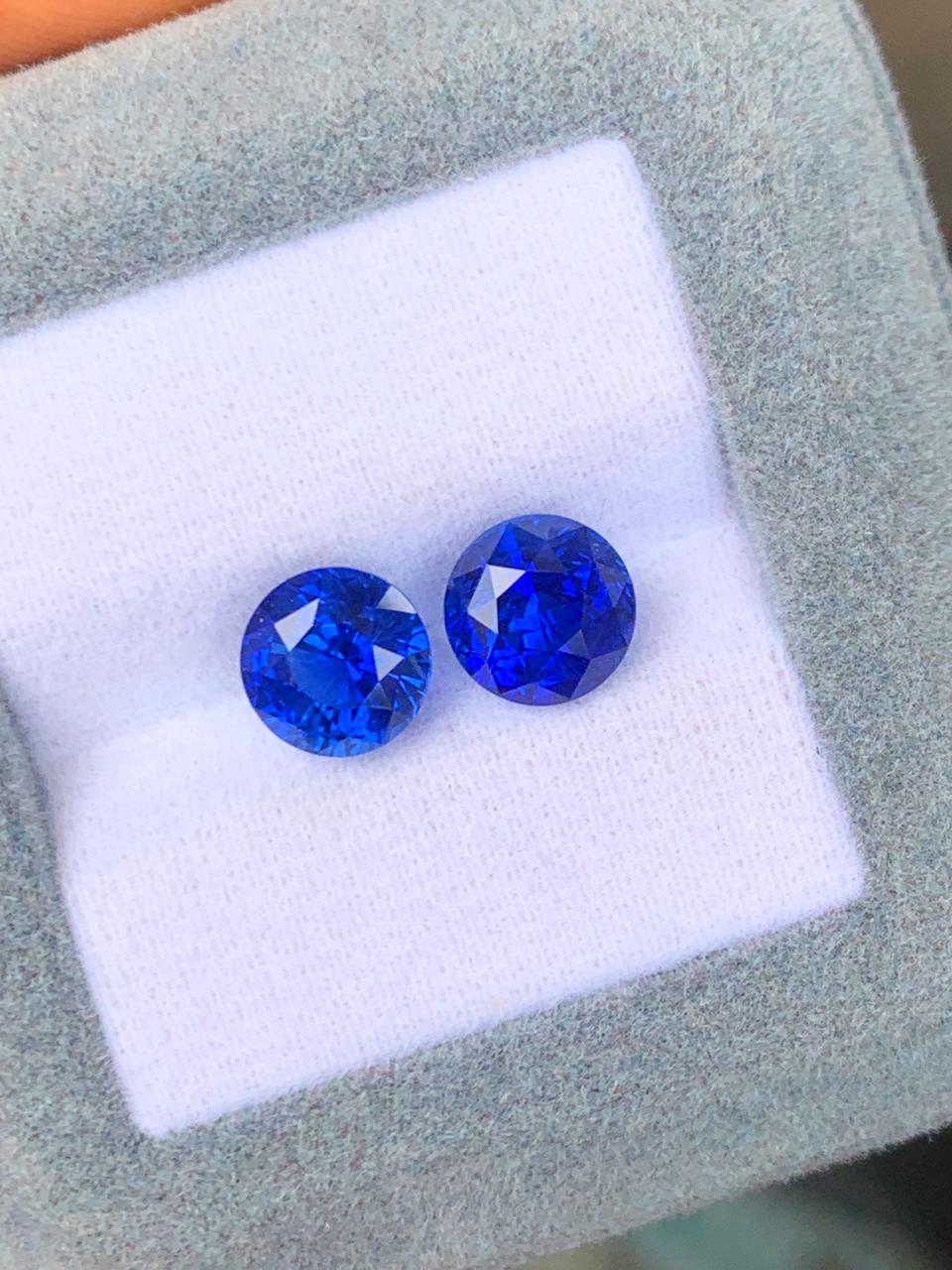 saphirs-bleu-paire-rond-3-15-ct-et-3-07-ct-photo-1