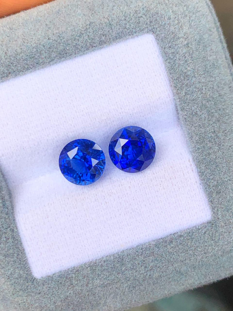 saphirs-bleu-paire-rond-3-15-ct-et-3-07-ct-photo-1